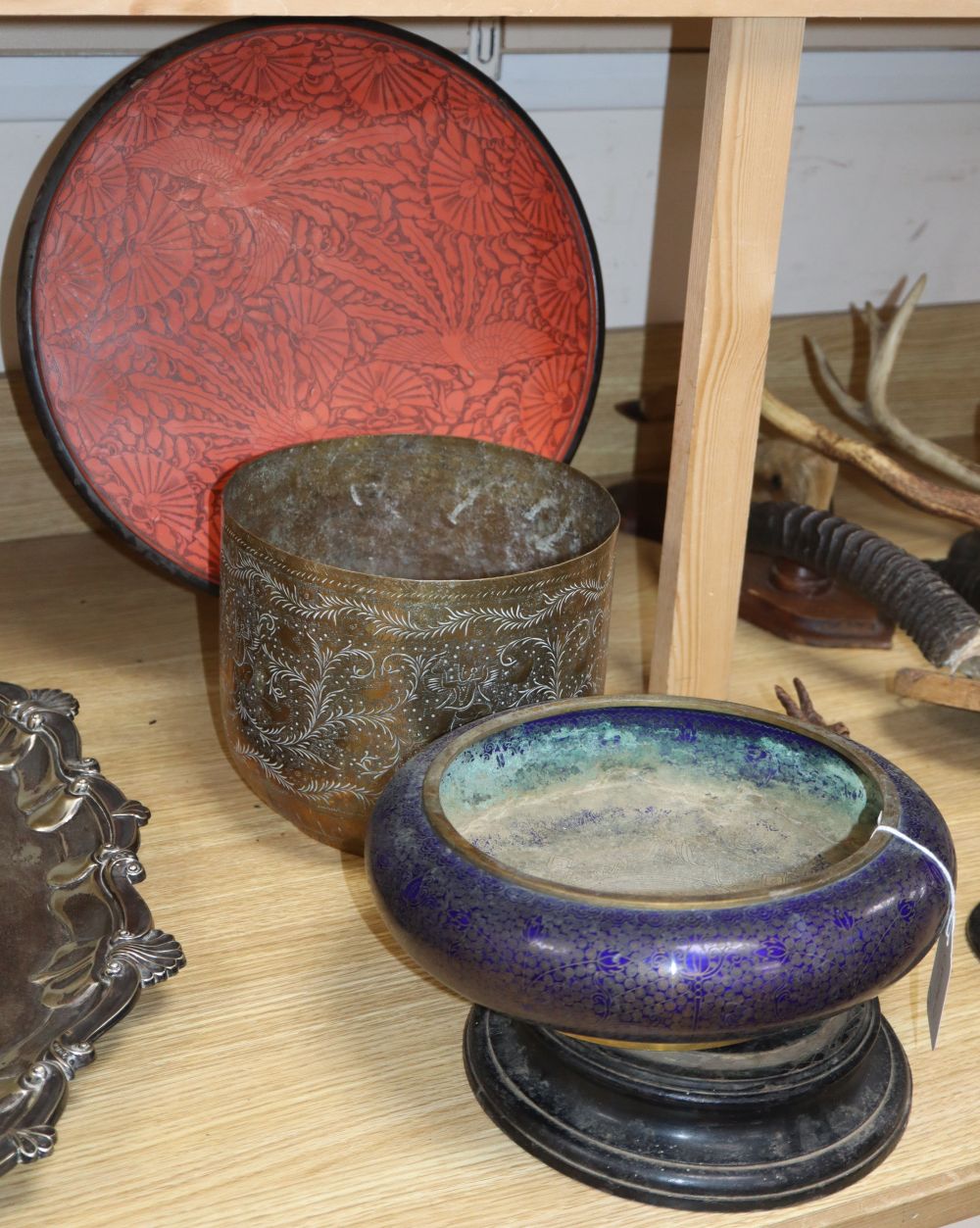 A Chinese cloisonne enamel bowl, a Burmese lacquer dish and an Indian brass bowl